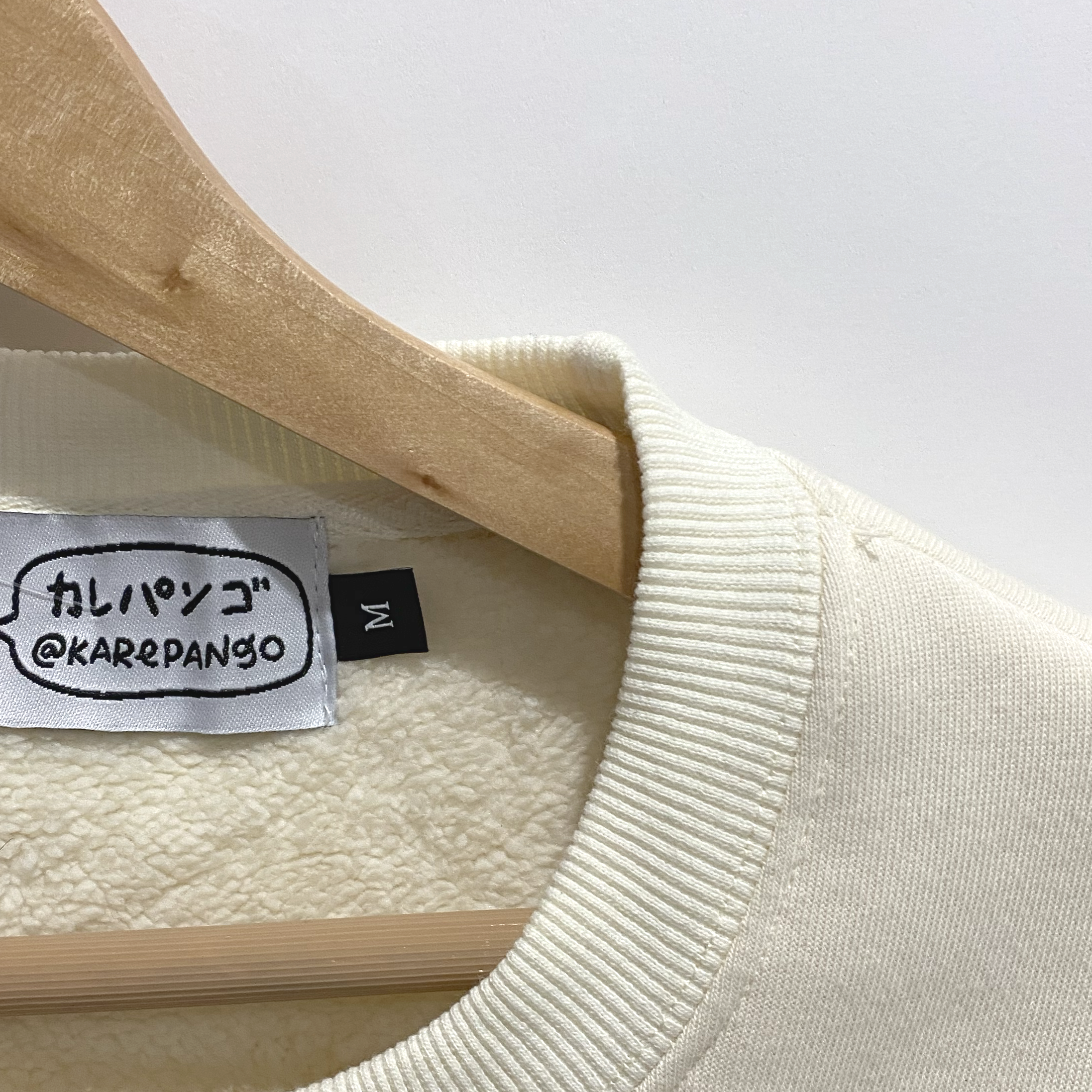 KONRAN: Embroidered long-sleeve thick sweater