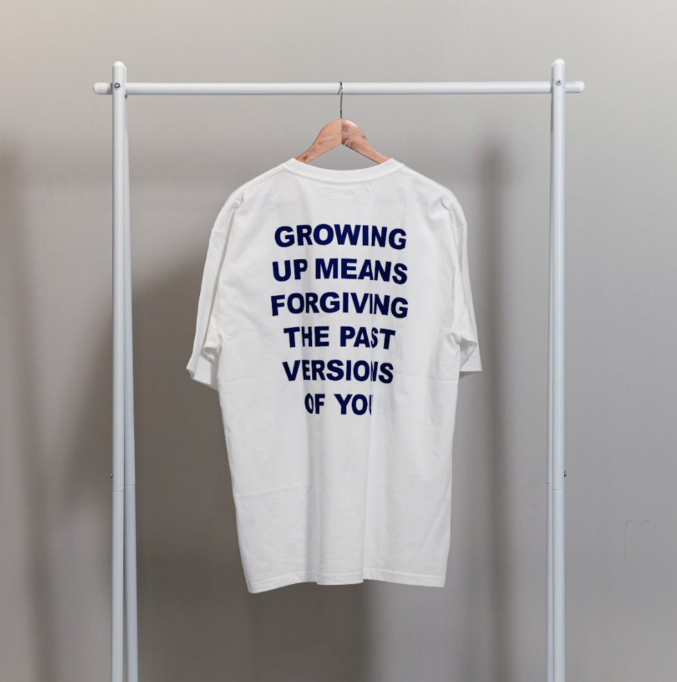 GROWING UP MEANS FORGIVING THE PAST VERSIONS OF YOU: Embroidered short sleeve t-shirt